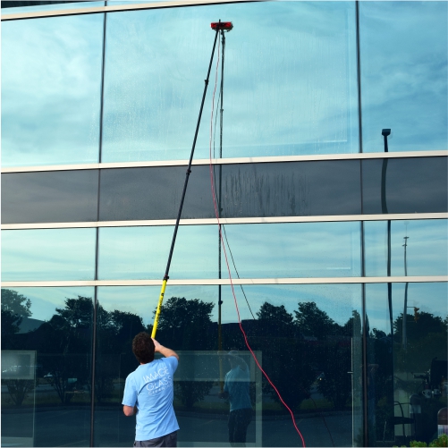 commercial window cleaning with water-feed poles